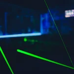 Laser tag play arena with fluorescent paint, energiser room.