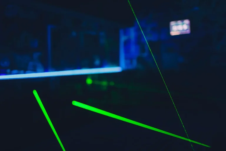 Laser tag play arena with fluorescent paint, energiser room.