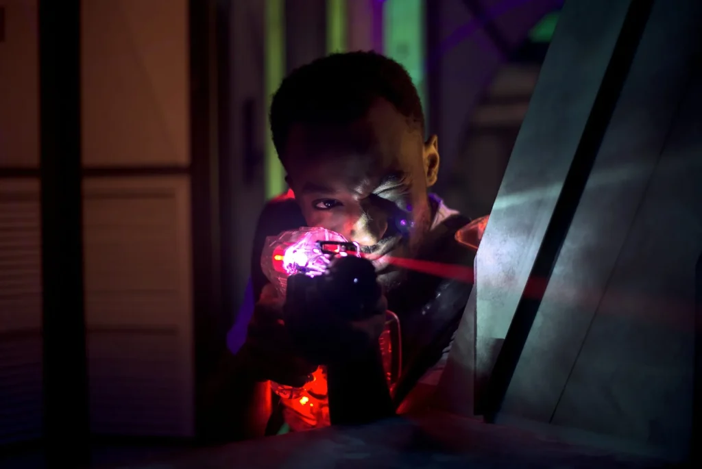 laser gun player shooting in futuristic labyrinth