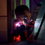 laser gun player shooting in futuristic labyrinth