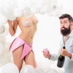 Man bearded bachelor celebrate drink champagne. Stag party. Sexy girl strip dancer surprise. Birthday stripper for him. Hipster bachelor celebrate. Idea bachelor party. Private dance for bachelor