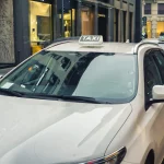 white taxi in Milan